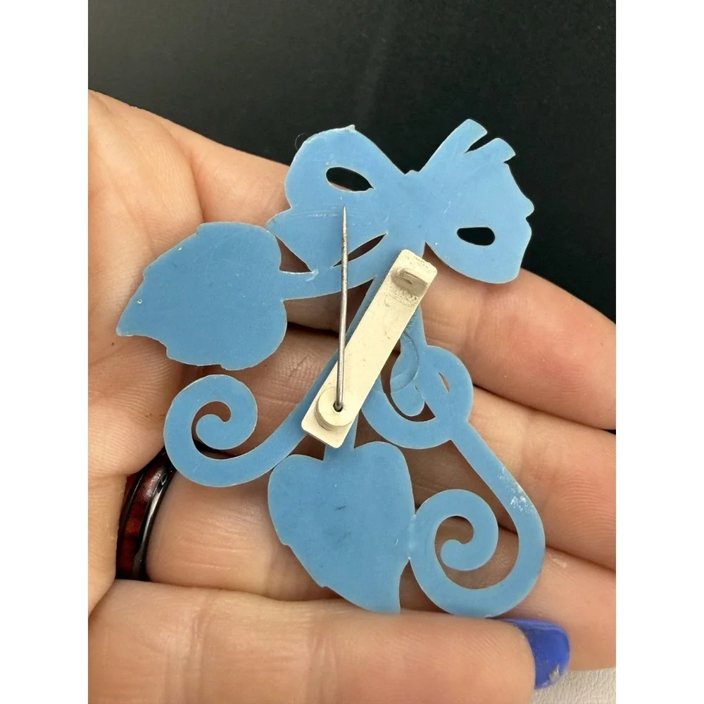 Vintage Brooch Light‎ Blue Molded Celluloid Bow